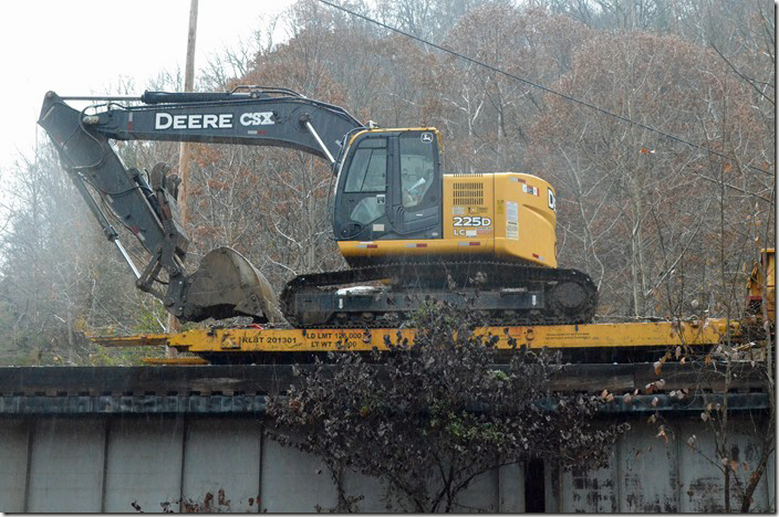 CSX MW Flat RLBT 201301. We know what that back-hoe does. Haysi VA.